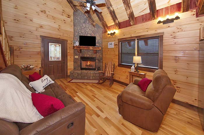 Cozy cabin living room with a fireplace