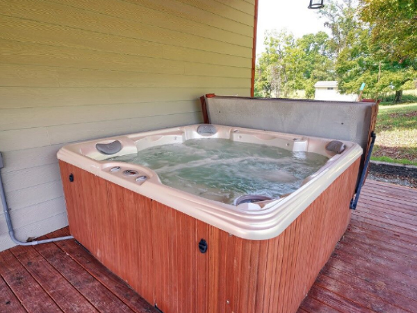 hot tub on covered deck
