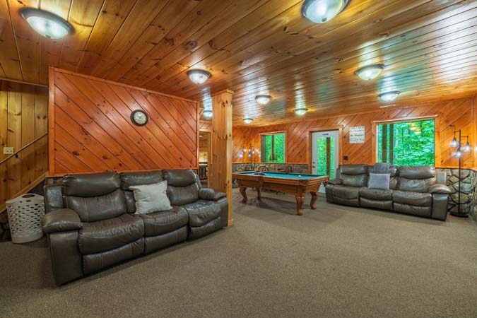 Lower-level lounge with a TV