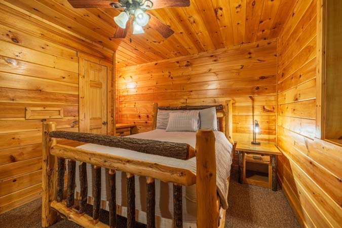 Queen log-bed bedroom