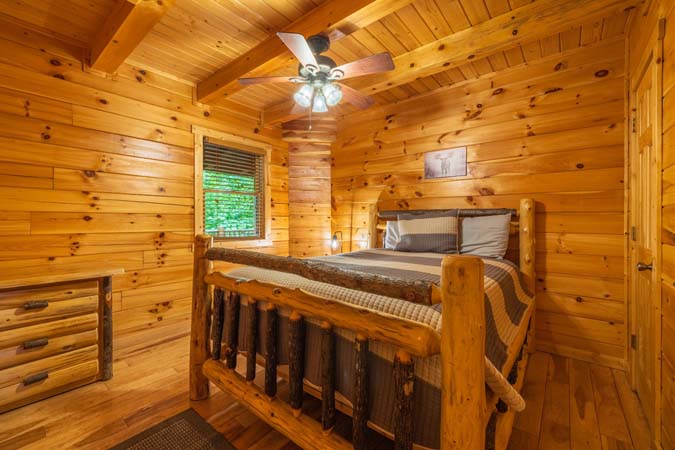 Queen log-bed bedroom
