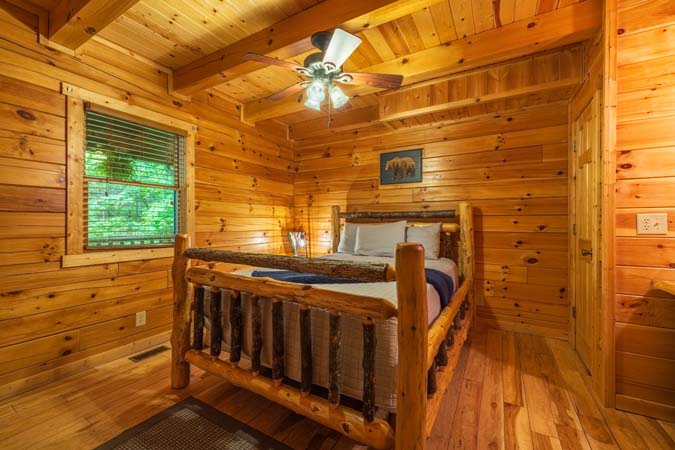 Queen log-bed bedroom
