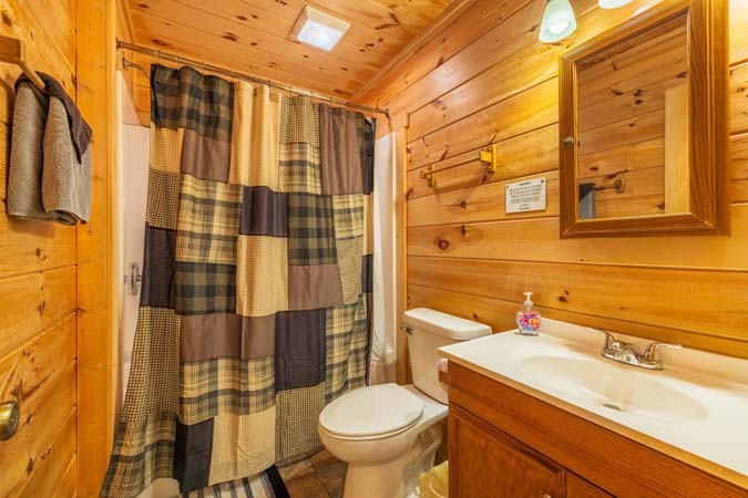 Full bathroom with a vanity