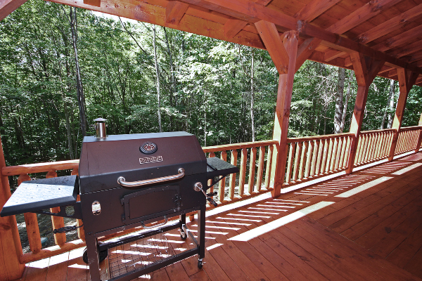 Grill on Back Deck, with Woods, behind Lodge, beyond.