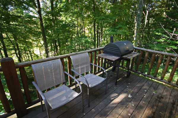 Corner of Deck with Deck Chairs and Charcoal Grill