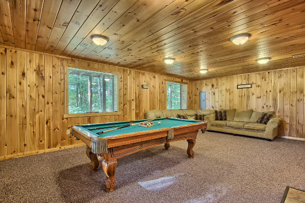 Another View of Pool Table, from Entry Door, with 2 Picture Windows on South Side Wall, and two couches in southwest corner. Now replaced with two Futon Bunks, not shown 