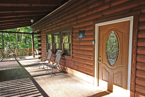 Front Deck of Lodge, showing Front Door, Deck Chairs and Porch Swing