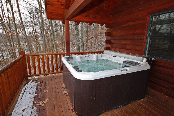 ho tub on covered deck