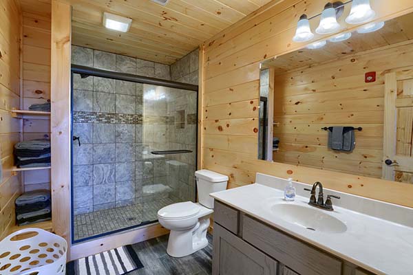 tiled shower in bathroom