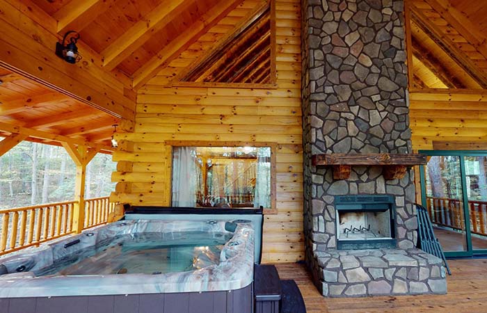 Hot Tub and Outdoor Fireplace on East Deck, with Door into Dining Room